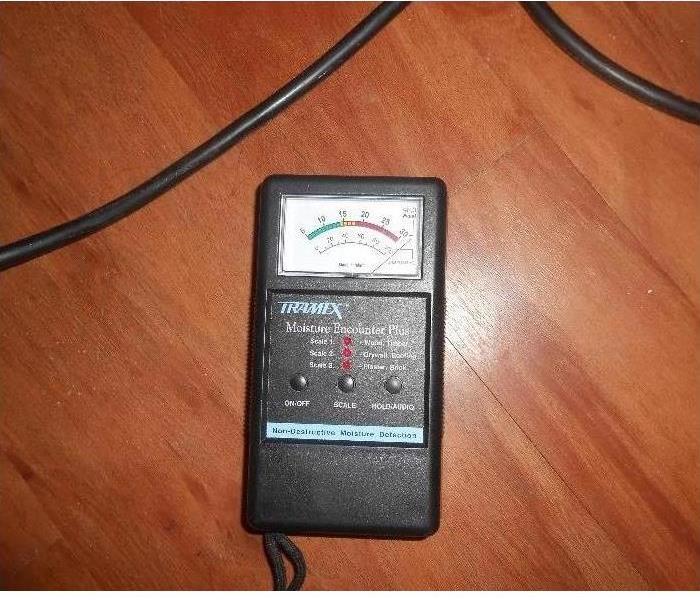 picture of black moisture meter