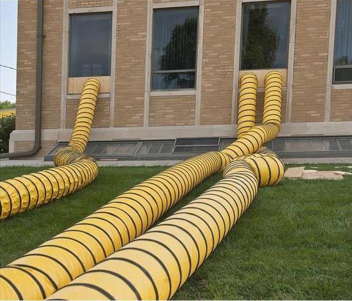 picture of a school and yellow tubes