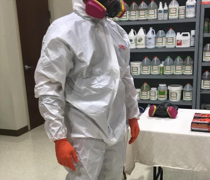 owner Robert Kueher in personal protective equipment
