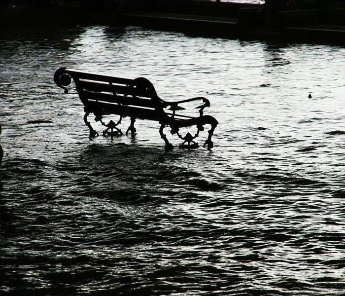 flood waters and a bench
